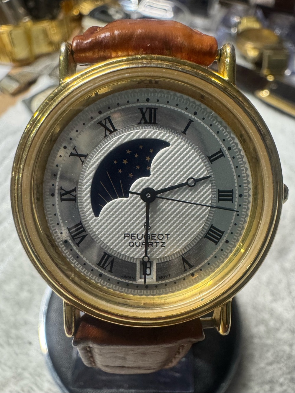 Peugeot Gold-Tone Watch with Brown Leather Strap and Blue Moonphase